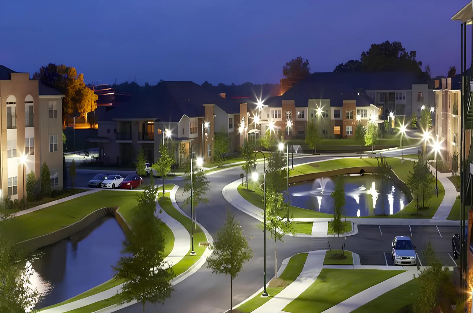 Indigo Park apartment community illuminated at dusk